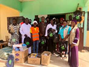 Presenting Supplies to the Delegate of Education