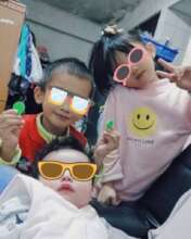 Apple, her younger brother and sister