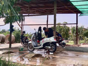 Child helping family business for income.