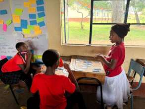 Children playing with cards