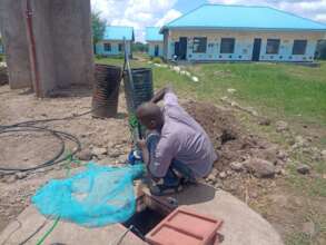 installing water pumps for well Nasholi primary