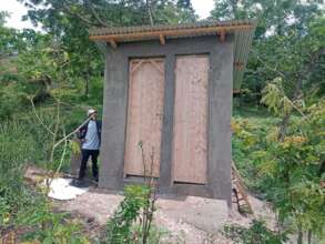 Tunu and Oliva need water for their new toilet