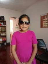 Ivon playing after homework with the glasses