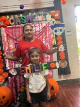 Fabiola and her mother at Dia de Muertos