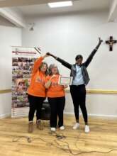 Sudanese refugees receiving their certificate