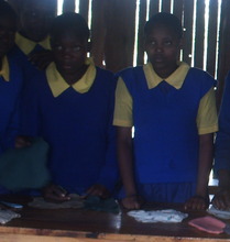 Girls making sanitary towels