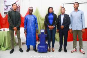 Innovators showcasing a robotic project