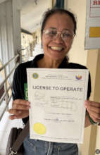 Head Midwife Marlene with our certificate!