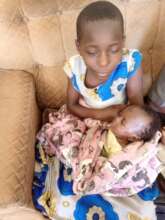 Kembabazi Ruth 10 years has dropped out of school
