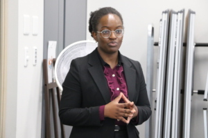 Promise Making a presentation about her project