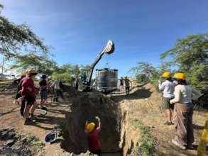 Final fieldwork day installing the biodigester