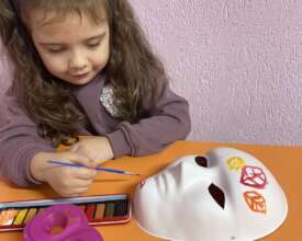 Girl painting mask