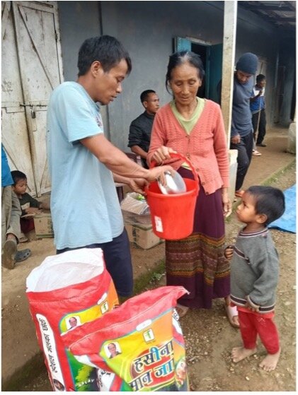 Beneficiary receiving support from the Food Bank