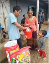 Beneficiary receiving support from the Food Bank