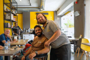 George, Agonista waiter , with one of WIP's tutors