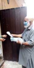 Student Receiving Items to Prepare for School