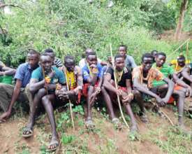 Pokot warriors attend a peace outreach camp