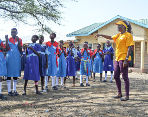 Monica at a CPIK peace camp