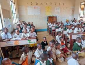 OVER CROWDED CLASS WITH KEEN PUPILS