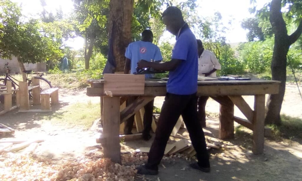 PORRIDGE AND DESKS FOR PRIMARY SCHOOL PUPILS