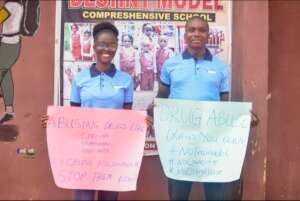 Team members at a high school campaign