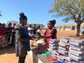 Giving school supplies & paying annual tuitions.