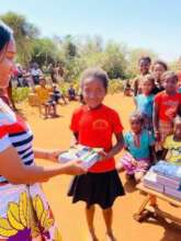 Giving school supplies & paying annual tuitions.