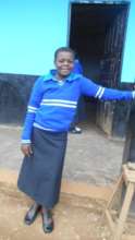 One of the OVC child infront of the classroom