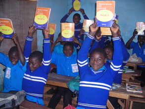 Children with their Text books in Class