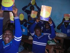 Children with their Text books in Class
