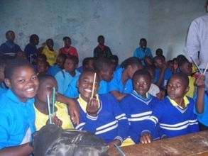 Students after receiving pencils from Mathew
