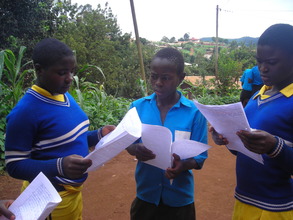 Some of the Orphans received their Exams Papers