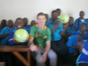 Volunteer Jon and the OVCs in class