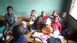 Children studying at home with thier teacher