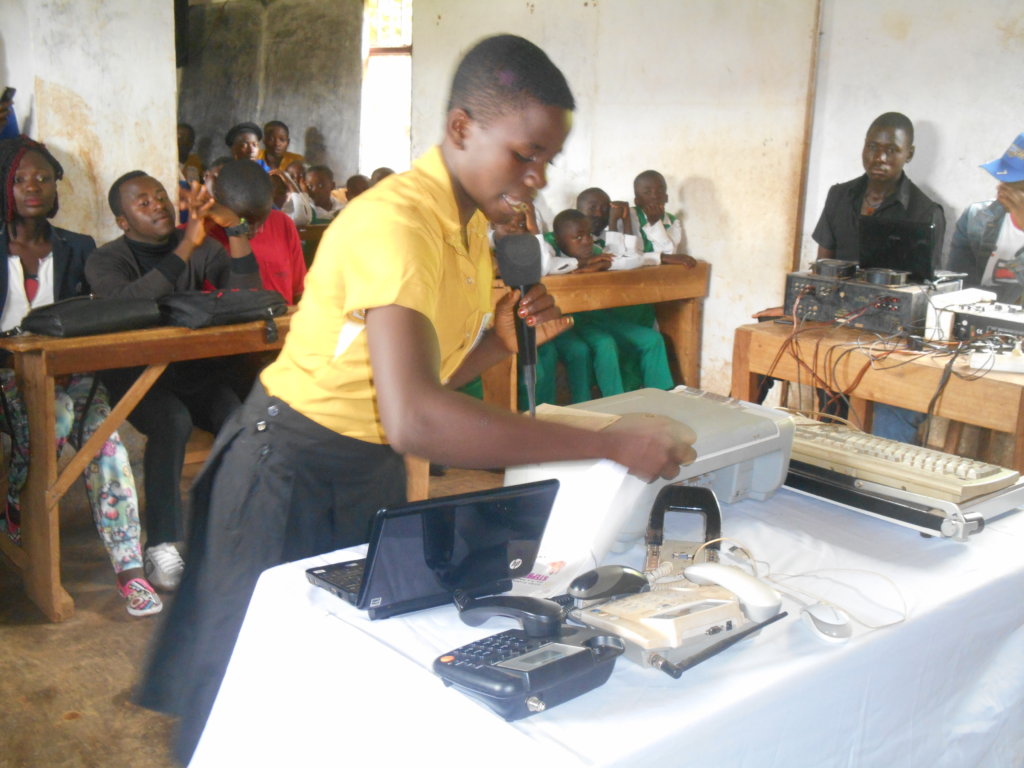 A student giving a presetation on office equipment