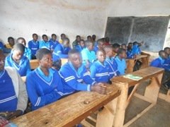Children in class receiving moral education