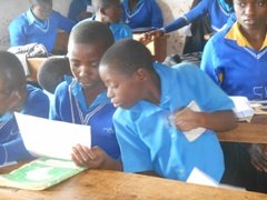 Children after receiving their exams papers