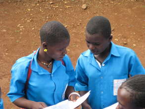 Jecenta and Madinatou discussing their results