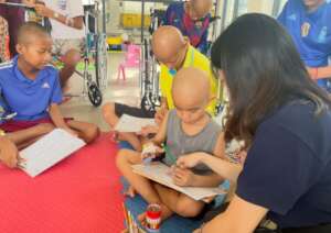 Songlong and other patients in play room