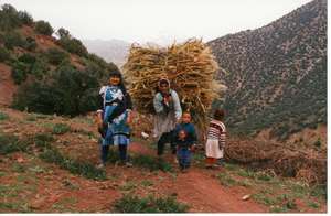 Women carrying bundles