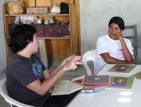 Woman participant with trainer, Oaxaca