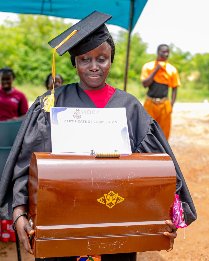 Presentation of sewing machine to each graduand