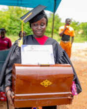 Presentation of sewing machine to each graduand