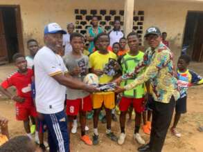 Presentation of football by Mr. Henry Duah