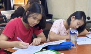 Two students who passed university entrance exams