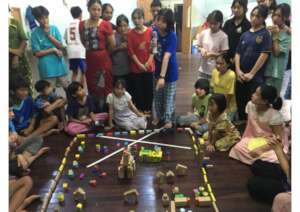 Children enjoying an educational game competition
