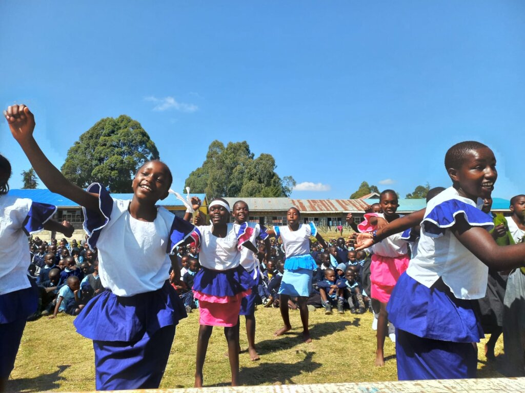Celebrating opening of new latrines at school