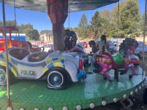 Enjoying the carousel (Family Day, 15 August 2026)