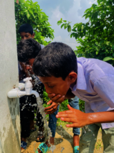 A student is cooling him in the hot summer