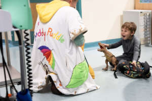 Dr Muddy Puddle and a child playing in hospital